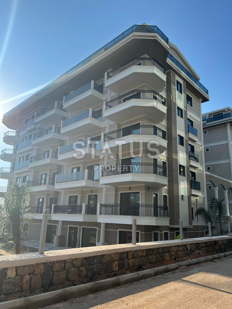 2 apartments: duplex with a garden and 1+1 in a new premium class residential complex in Kargicak. фото 13