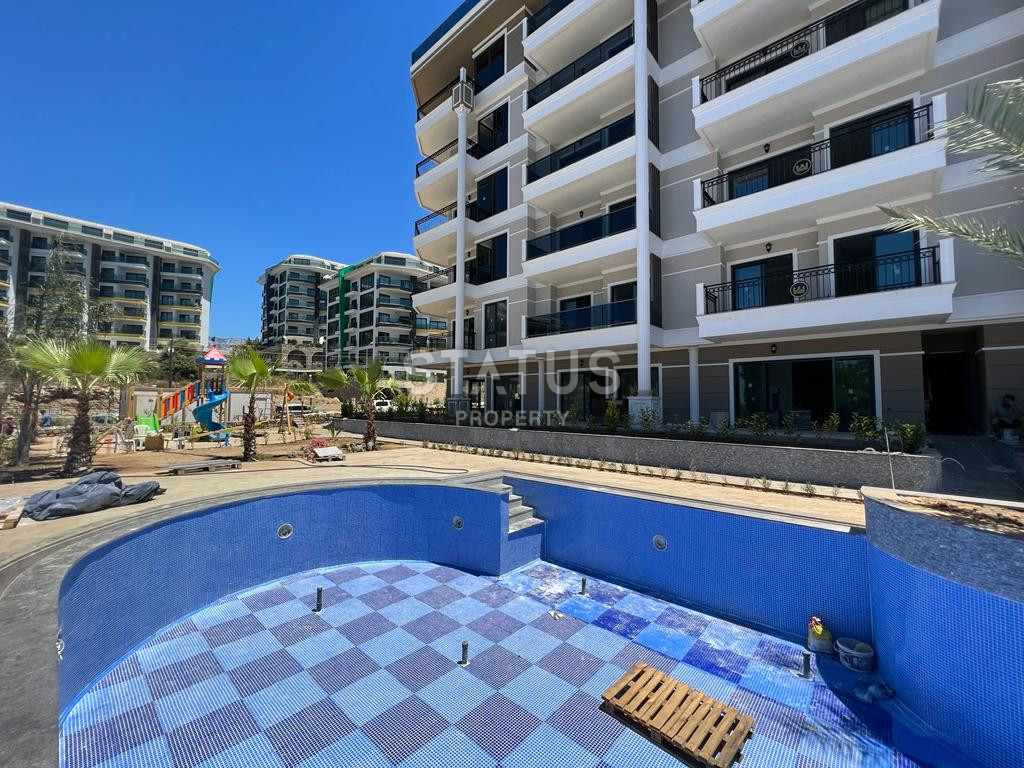 2 apartments: duplex with a garden and 1+1 in a new premium class residential complex in Kargicak. фото 14