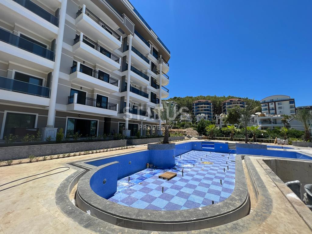 2 apartments: duplex with a garden and 1+1 in a new premium class residential complex in Kargicak. фото 24