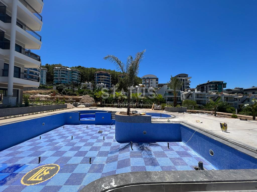 2 apartments: duplex with a garden and 1+1 in a new premium class residential complex in Kargicak. фото 25