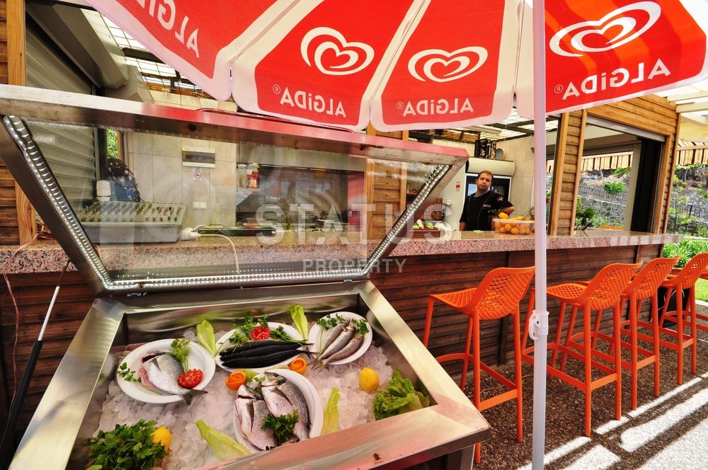 Фешенебельный прект на первой береговой линии с отельной инфраструктурой в районе Каргыджак фото 40