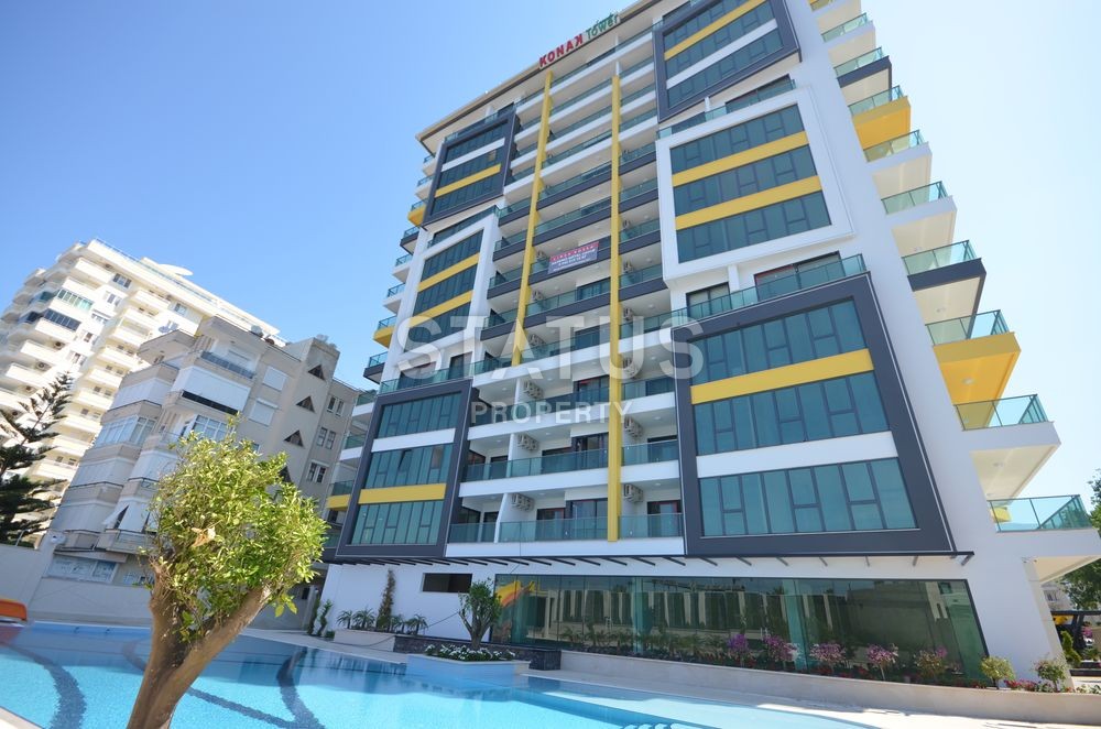 Квартиры в элитном комплексе на первой береговой линии в Махмутларе. фото 1