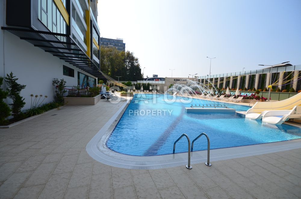 Квартиры в элитном комплексе на первой береговой линии в Махмутларе. фото 16