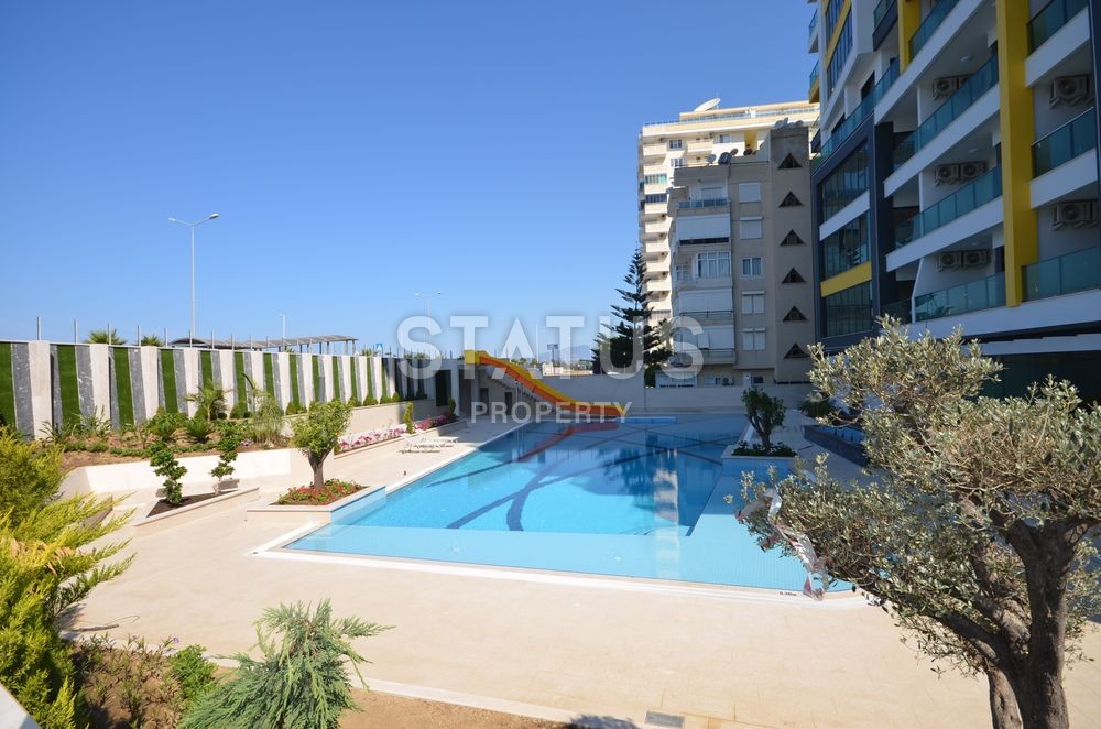 Квартиры в элитном комплексе на первой береговой линии в Махмутларе. фото 20