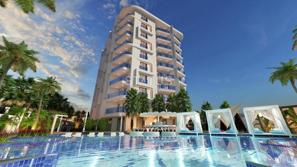 Apartment 1 + 1 in a building under construction in the very center of Alanya 70 m2 фото 11