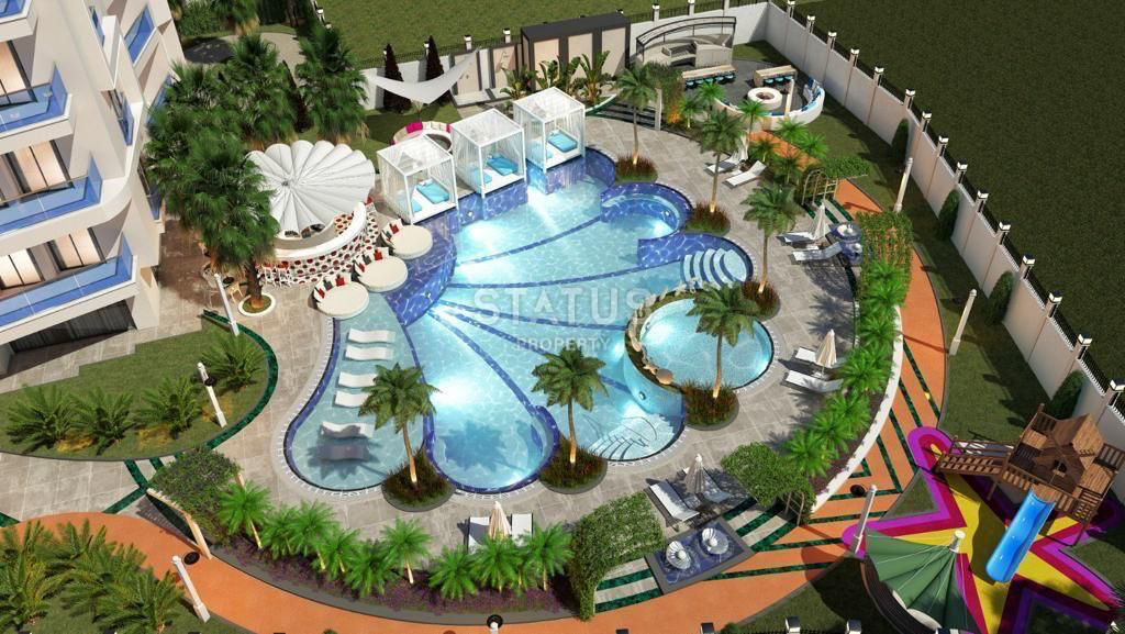 Apartment 1 + 1 in a building under construction in the very center of Alanya 70 m2 фото 13