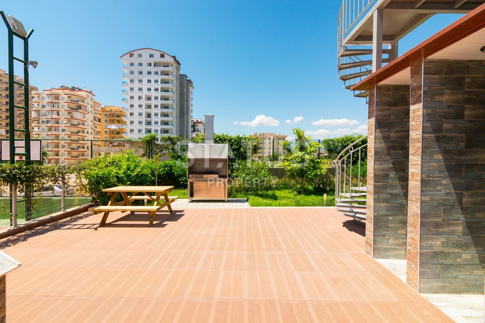 Роскошные апартаменты в современном комплексе в развитом районе Махмутлар фото 16