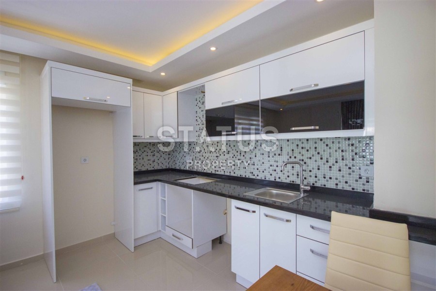 Меблированная двухкомнатная квартира в новом комплексе, в районе Кестель, 60 м2. фото 10