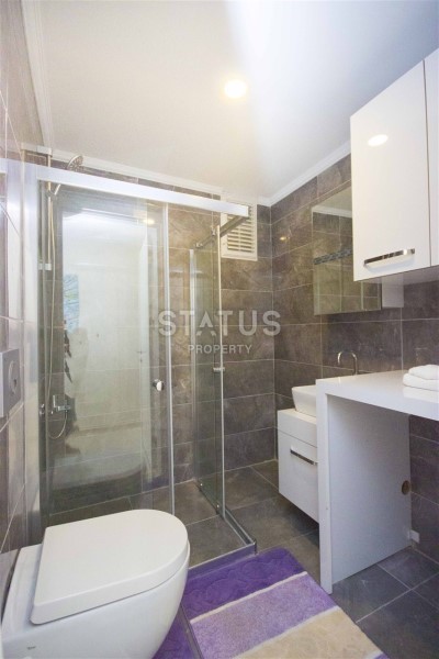 Меблированная двухкомнатная квартира в новом комплексе, в районе Кестель, 60 м2. фото 13