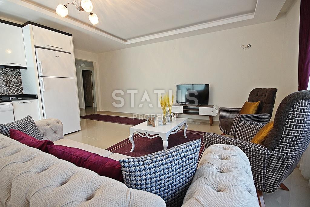 Меблированная трехкомнатная квартира в новом комплексе в Махмутларе, 110 м2. фото 6