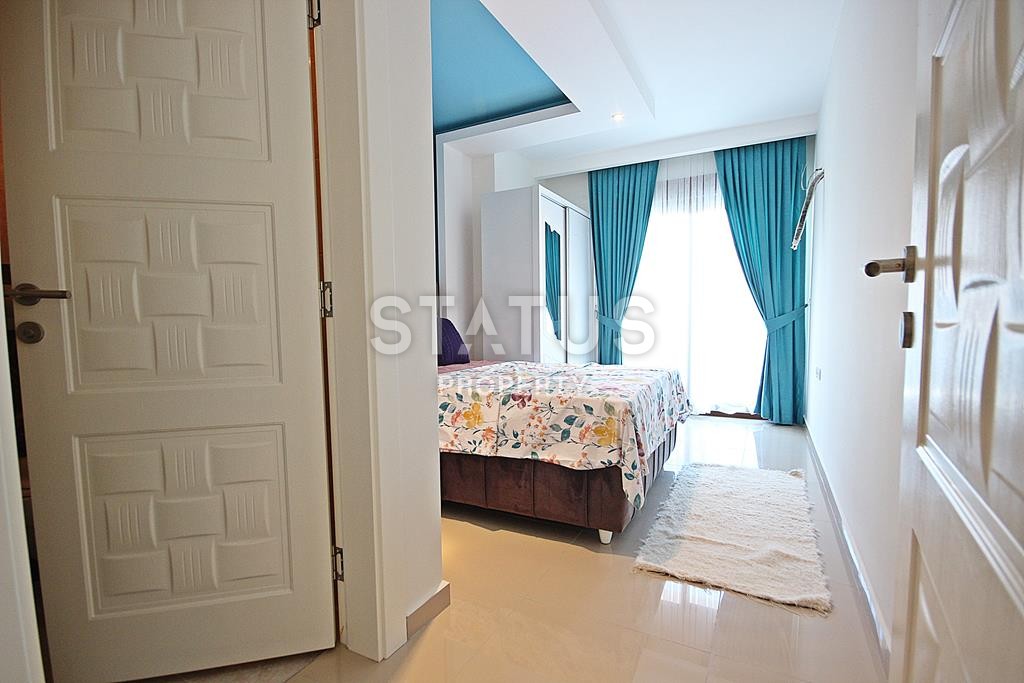 Меблированная трехкомнатная квартира в новом комплексе в Махмутларе, 110 м2. фото 12