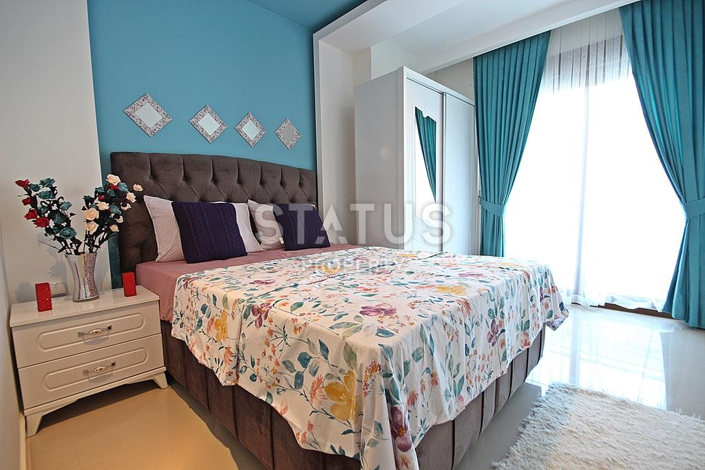 Меблированная трехкомнатная квартира в новом комплексе в Махмутларе, 110 м2. фото 13