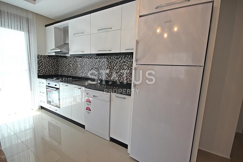 Меблированная трехкомнатная квартира в новом комплексе в Махмутларе, 110 м2. фото 15