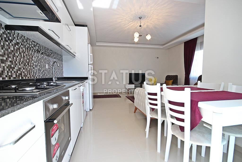 Меблированная трехкомнатная квартира в новом комплексе в Махмутларе, 110 м2. фото 16