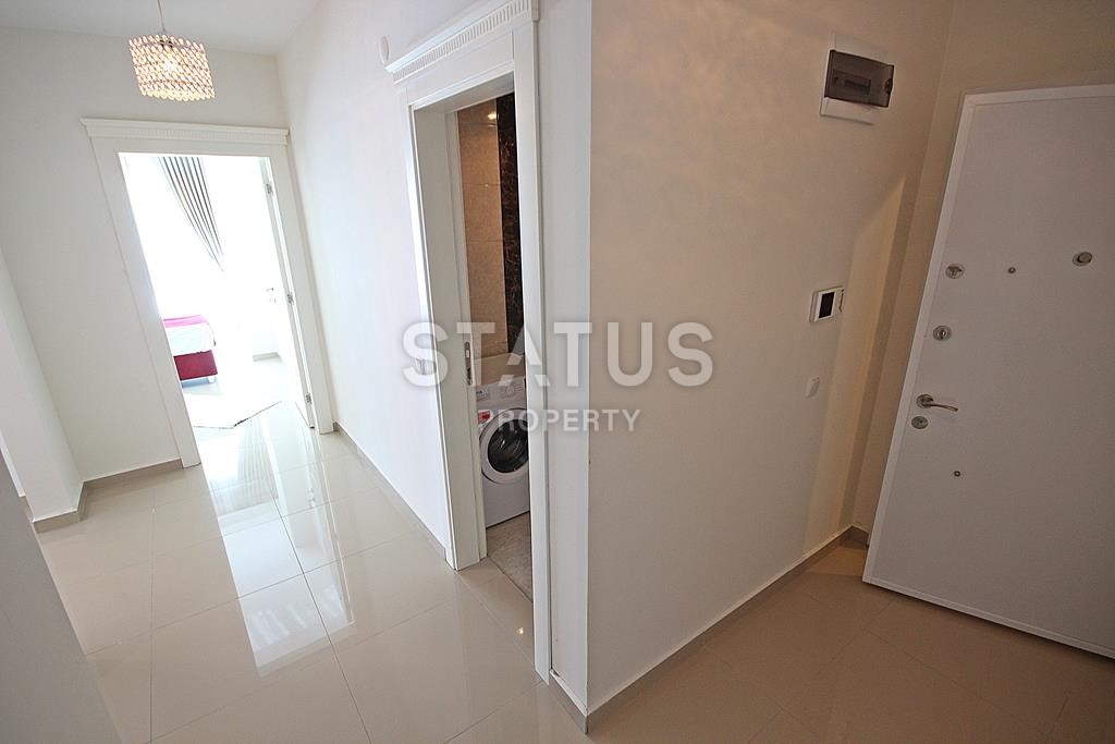 Меблированная трехкомнатная квартира в новом комплексе в Махмутларе, 110 м2. фото 20