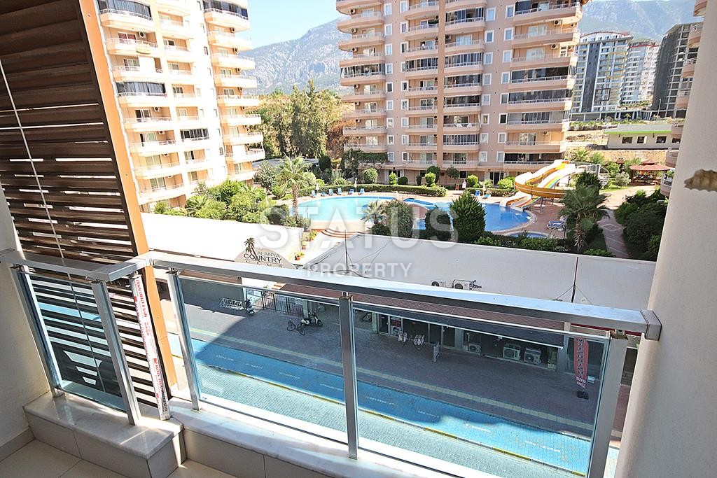 Меблированная трехкомнатная квартира в новом комплексе в Махмутларе, 110 м2. фото 23