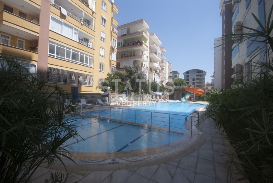 Уютная трехкомнатная квартира в новом комплексе в Махмутларе, 105 м2. фото 18