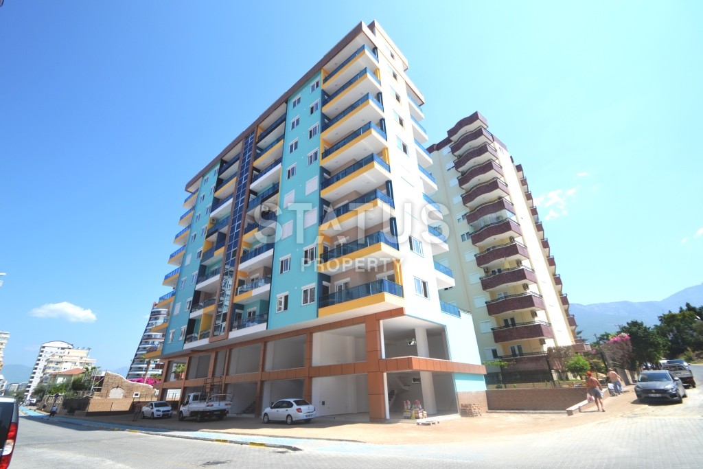 Двухкомнатные апартаменты в комплексе с бассейном в Махмутларе, 65 м2. фото 13