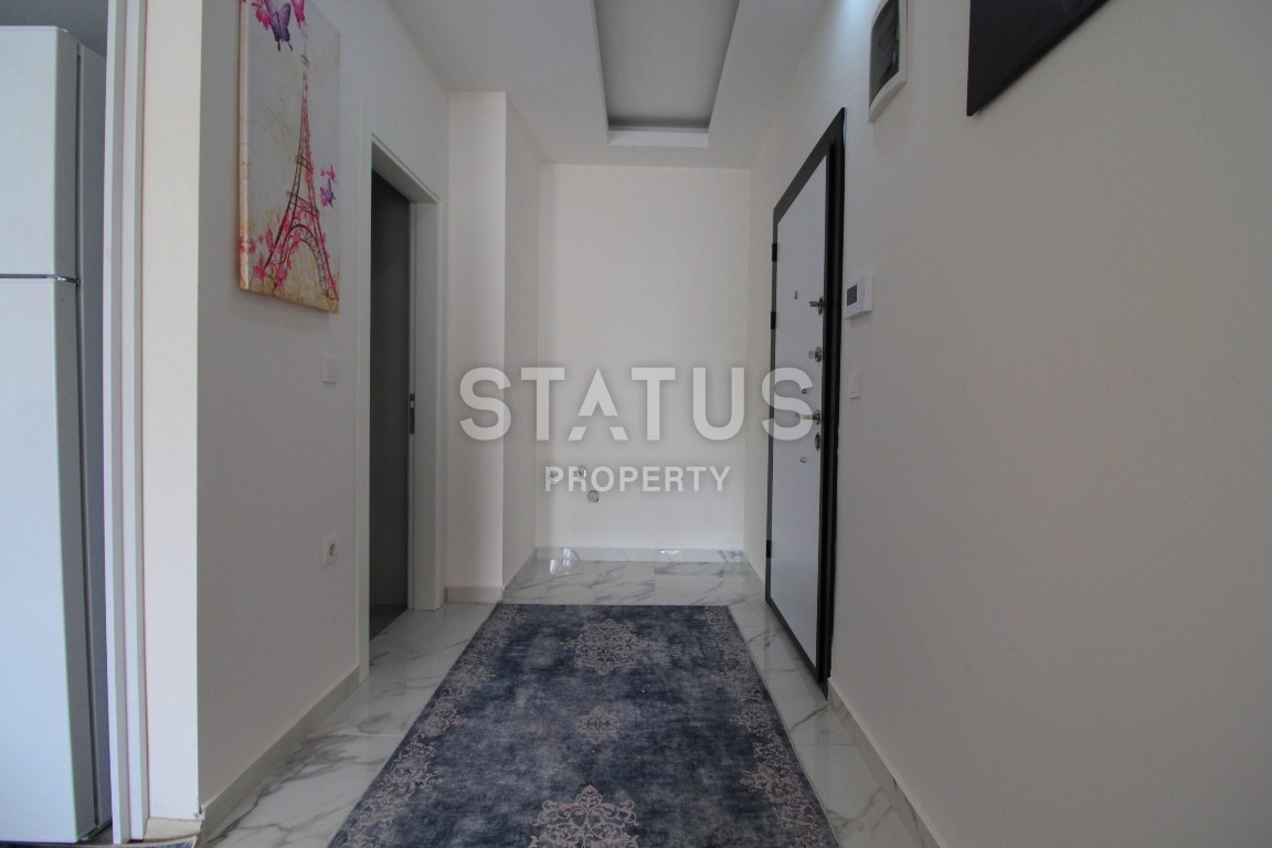 Двухкомнатные апартаменты в комплексе с бассейном в Махмутларе, 65 м2. фото 8