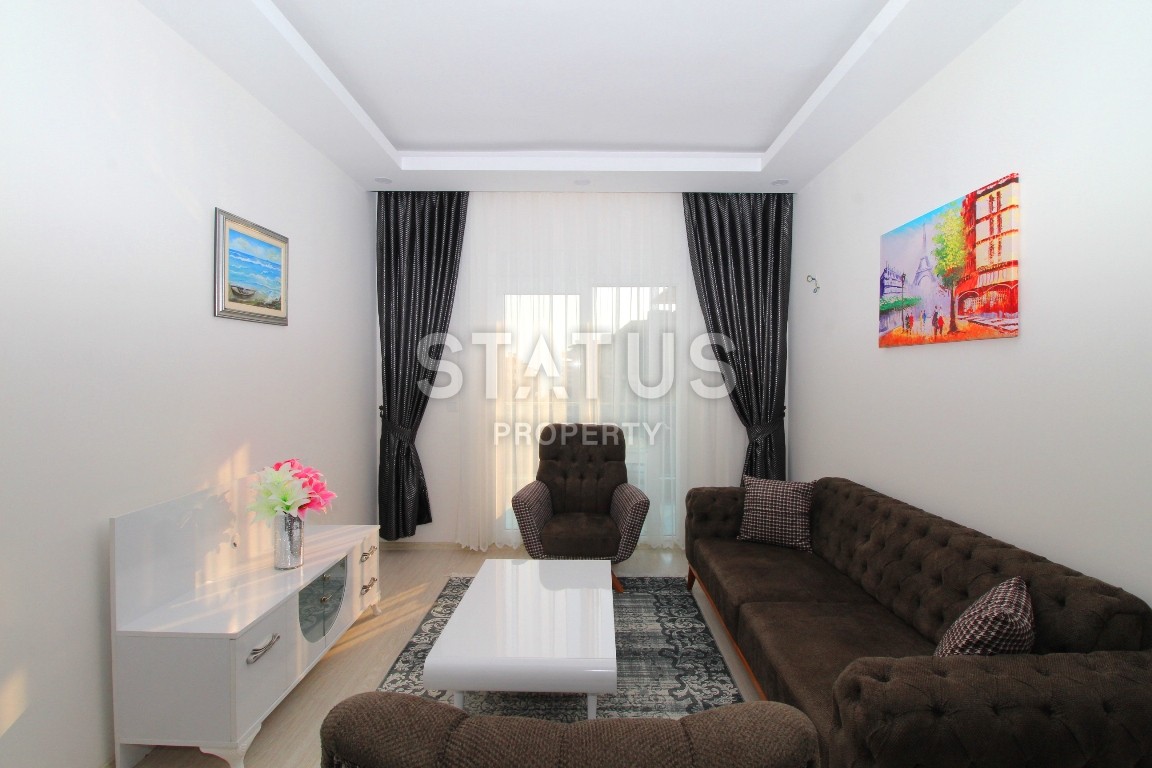 Двухкомнатные апартаменты в комплексе с бассейном в Махмутларе, 65 м2. фото 5