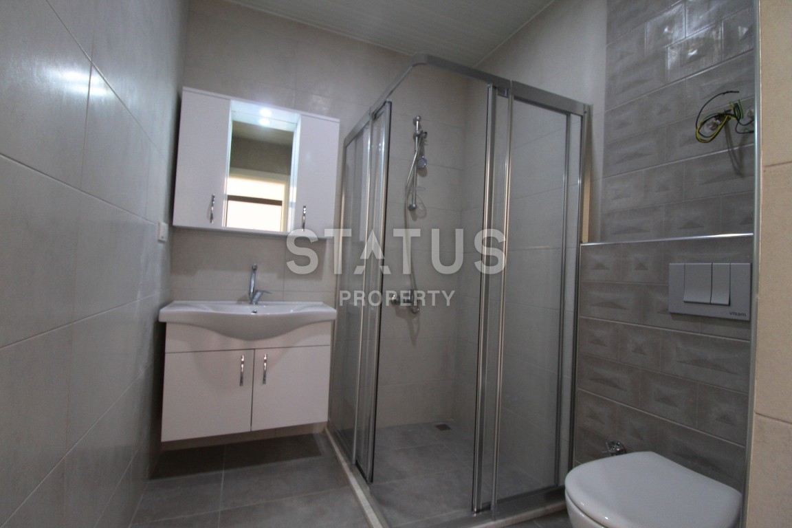 Двухкомнатные апартаменты в комплексе с бассейном в Махмутларе, 65 м2. фото 7