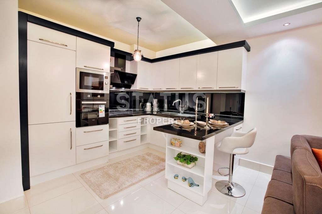 Апартаменты в новом жилом комплексе в районе Тосмур фото 4