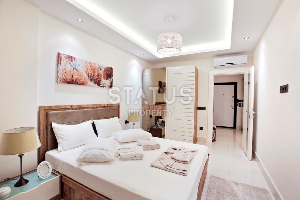 Апартаменты в новом жилом комплексе в районе Тосмур фото 7