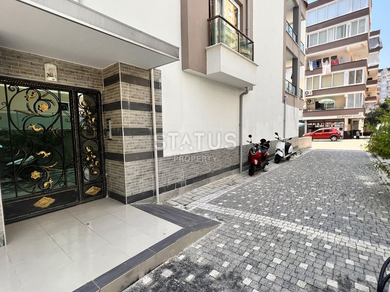 Трёхкомнатная меблированная квартира в доме городского типа в Махмутларе. 90м2 фото 5