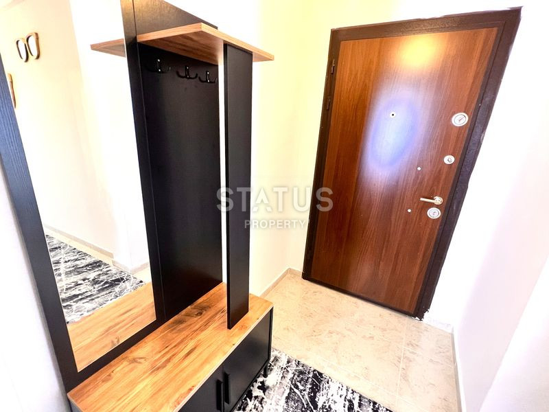 Трёхкомнатная меблированная квартира в доме городского типа в Махмутларе. 90м2 фото 8