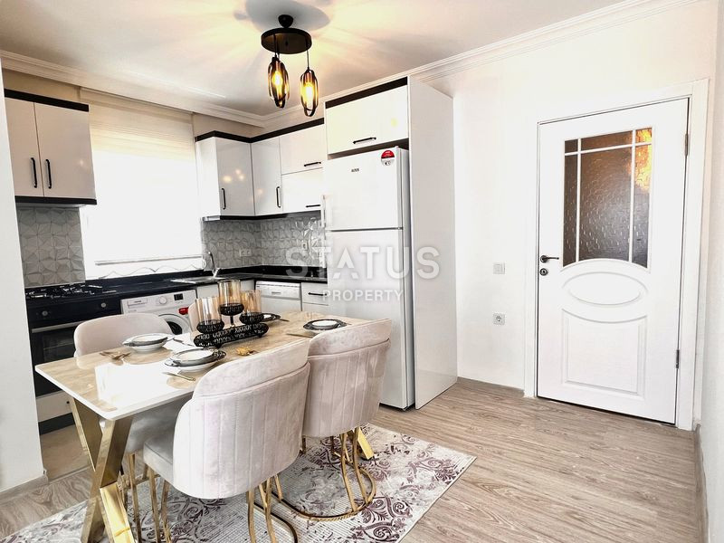 Трёхкомнатная меблированная квартира в доме городского типа в Махмутларе. 90м2 фото 10