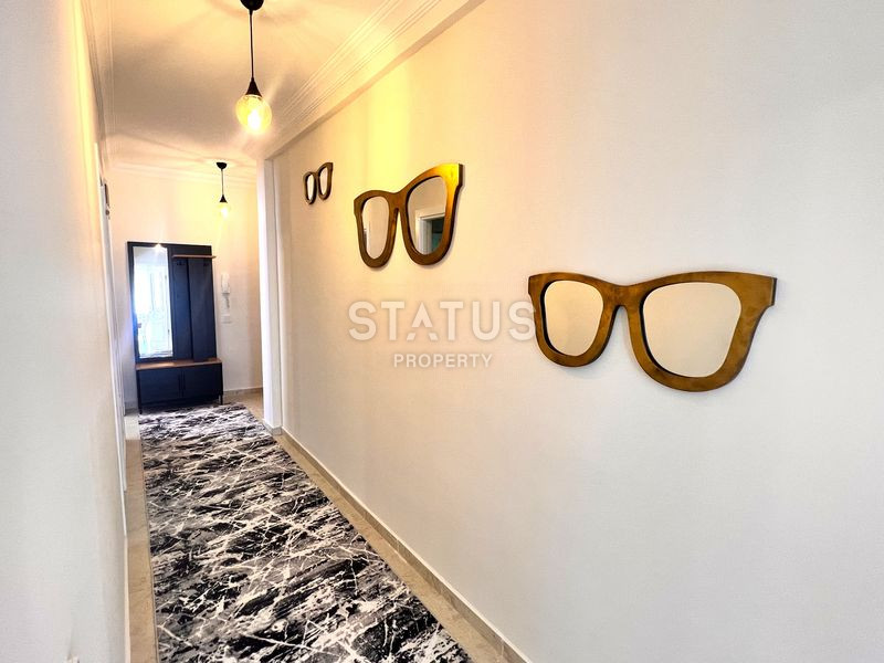 Трёхкомнатная меблированная квартира в доме городского типа в Махмутларе. 90м2 фото 11