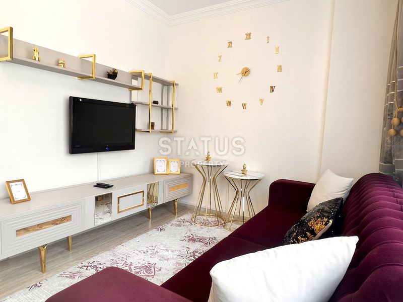 Трёхкомнатная меблированная квартира в доме городского типа в Махмутларе. 90м2 фото 12