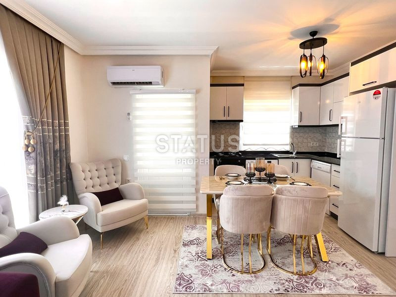 Трёхкомнатная меблированная квартира в доме городского типа в Махмутларе. 90м2 фото 15