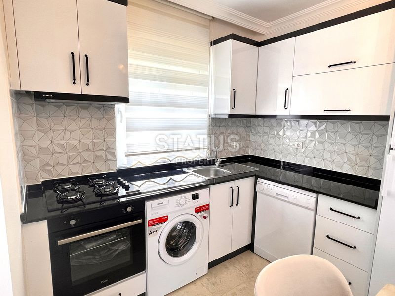 Трёхкомнатная меблированная квартира в доме городского типа в Махмутларе. 90м2 фото 18