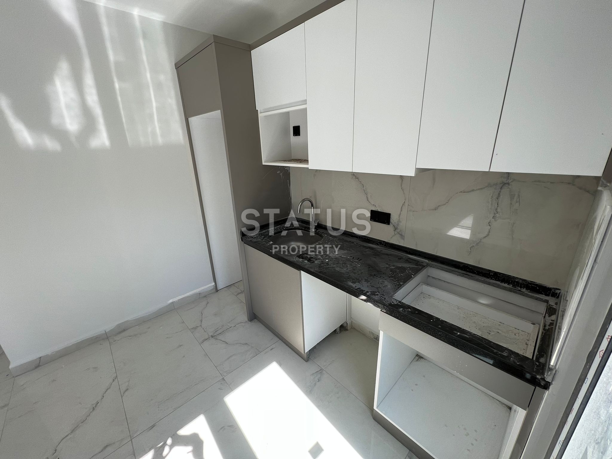 Двухкомнатные квартиры в новом ЖК в центре Аланьи 250м от моря. 50м2 фото 8