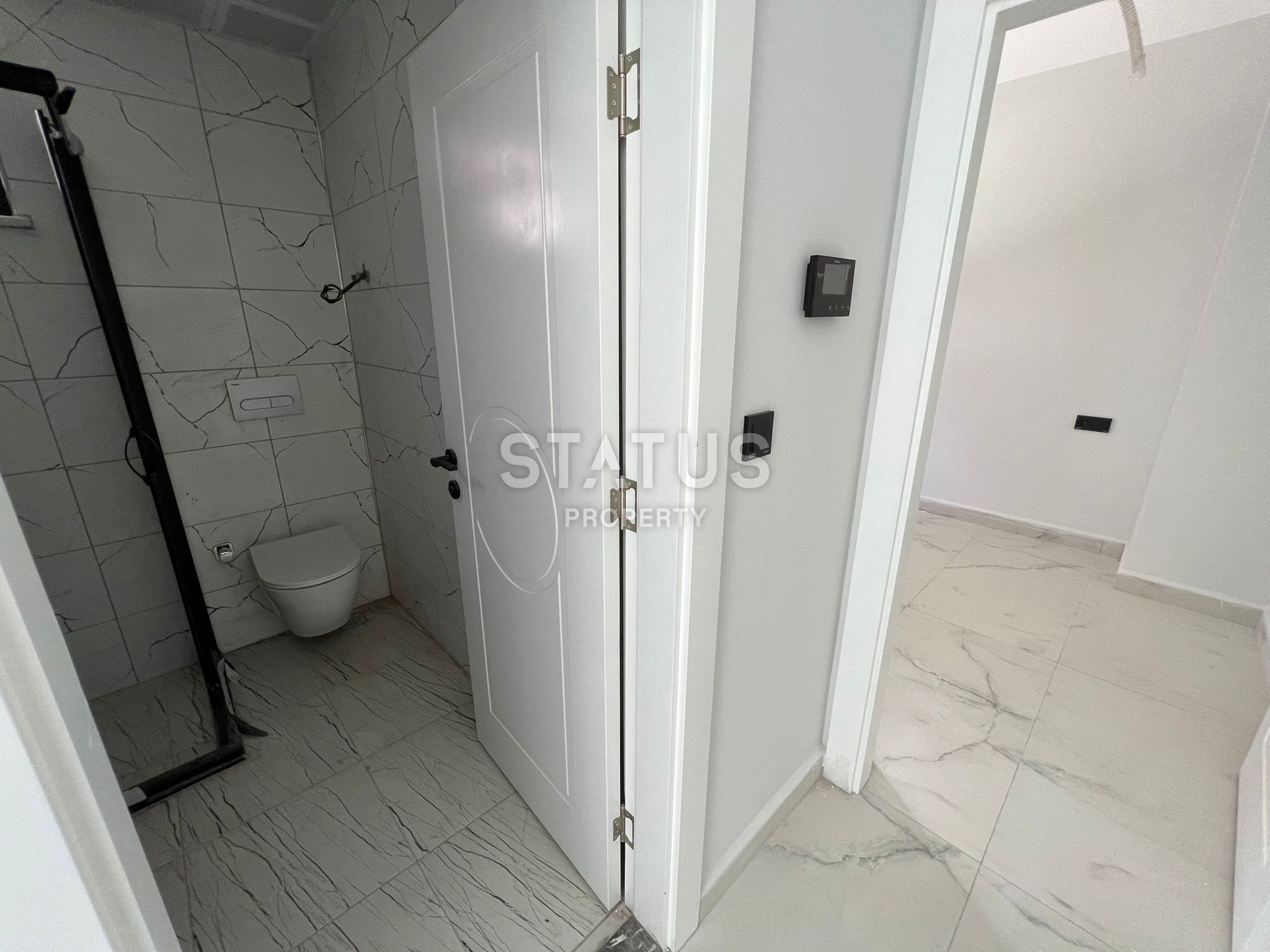 Двухкомнатные квартиры в новом ЖК в центре Аланьи 250м от моря. 50м2 фото 11