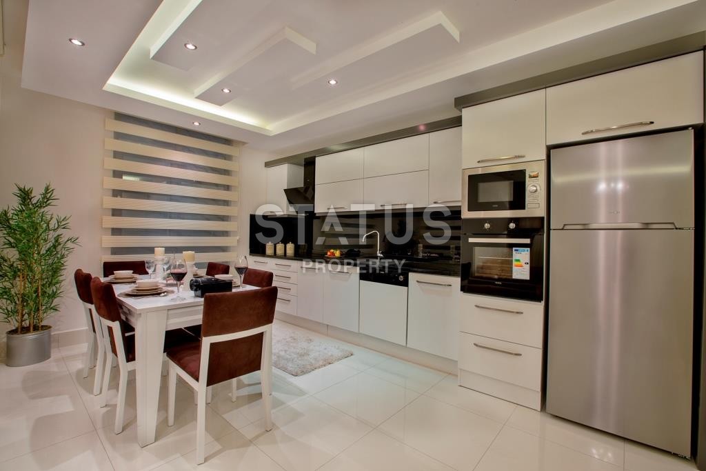 Апартаменты в новом жилом комплексе в районе Тосмур фото 12