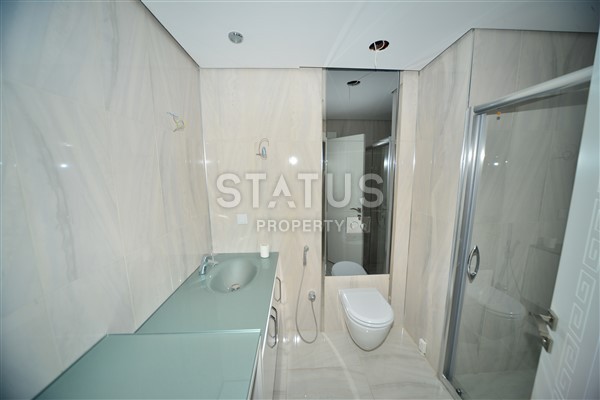 Апартаменты 1+1 класса люкс на первой береговой линии в Махмутларе, 65 м2 фото 5