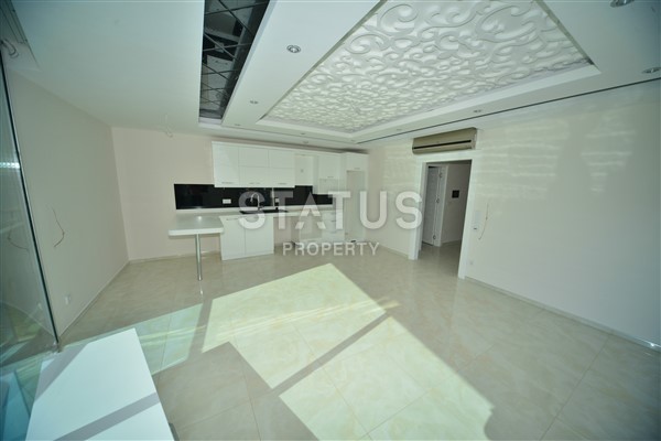 Апартаменты 1+1 класса люкс на первой береговой линии в Махмутларе, 65 м2 фото 3