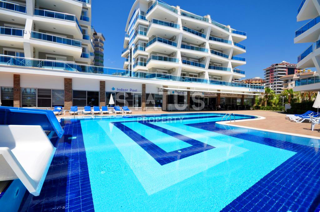 Меблированные двухкомнатные апартаменты в Джикджилли, 65 м2. фото 2