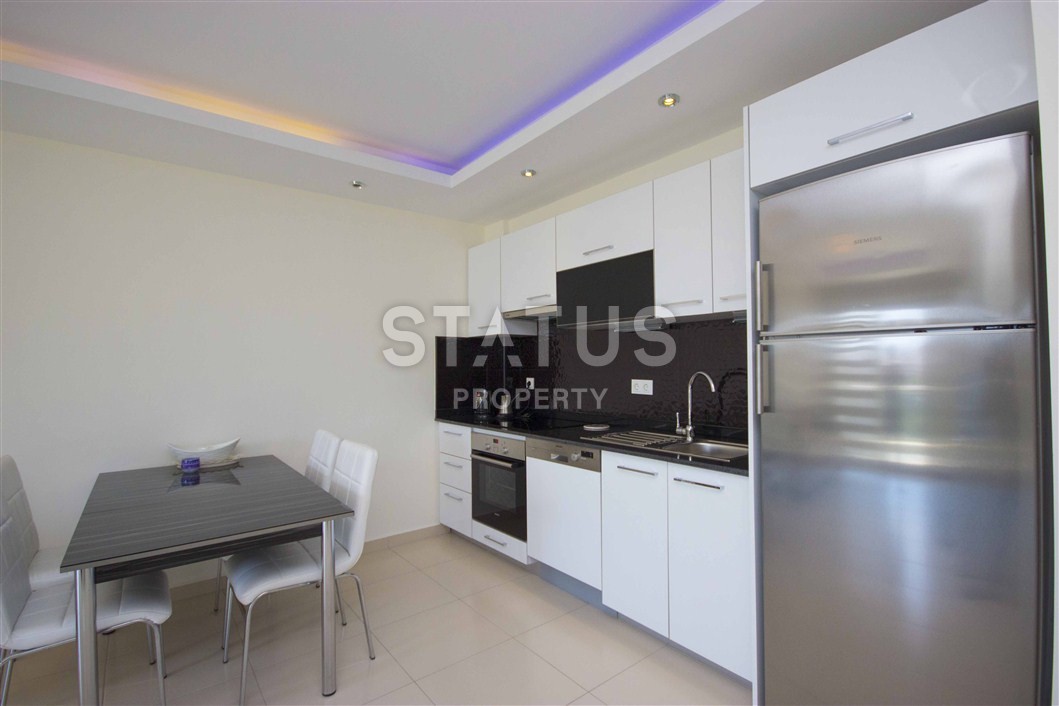 Меблированные двухкомнатные апартаменты в Джикджилли, 65 м2. фото 5