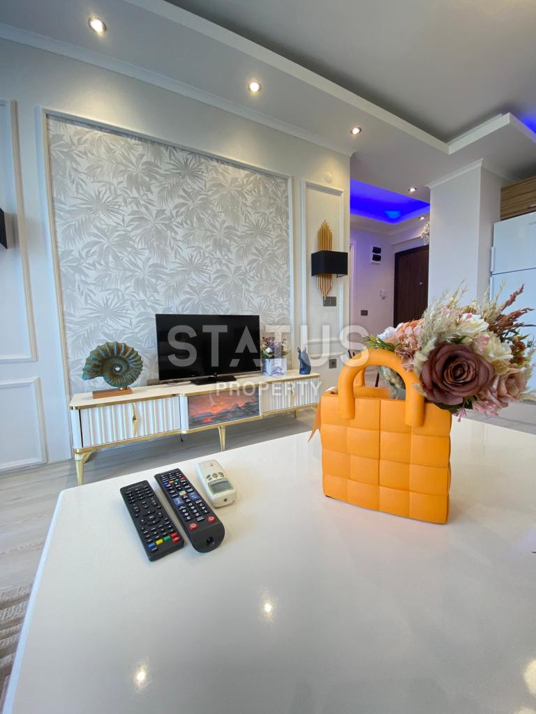 One bedroom furnished apartment with sea view in Mahmutlar. 65m2 фото 3