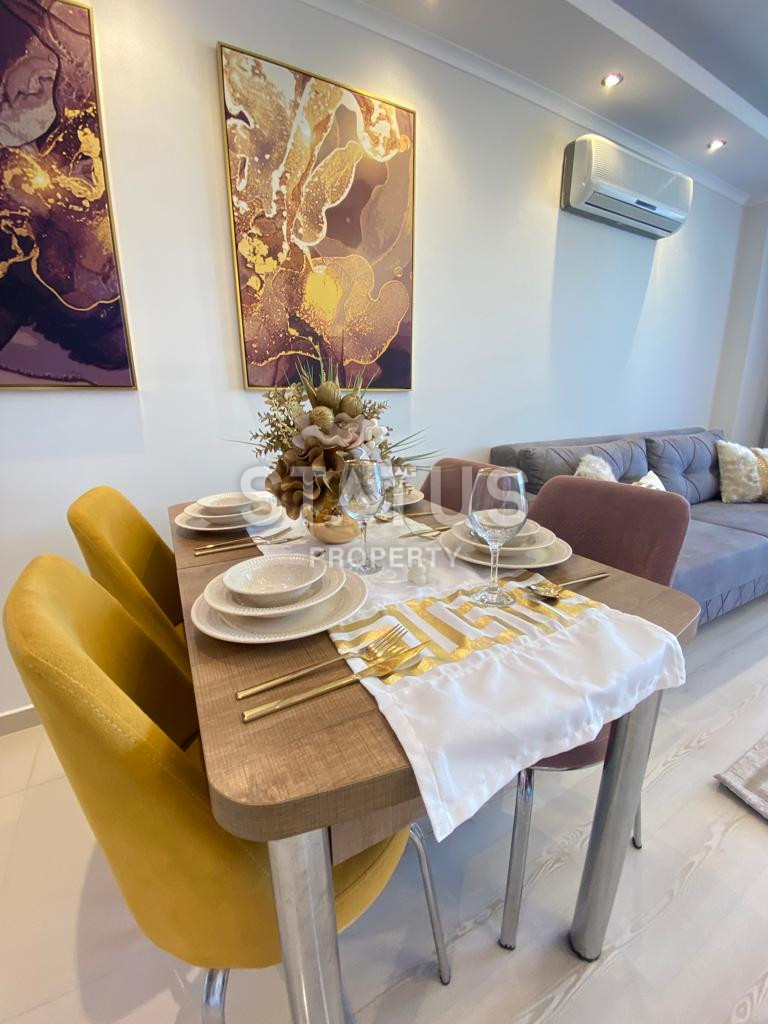 One bedroom furnished apartment with sea view in Mahmutlar. 65m2 фото 6