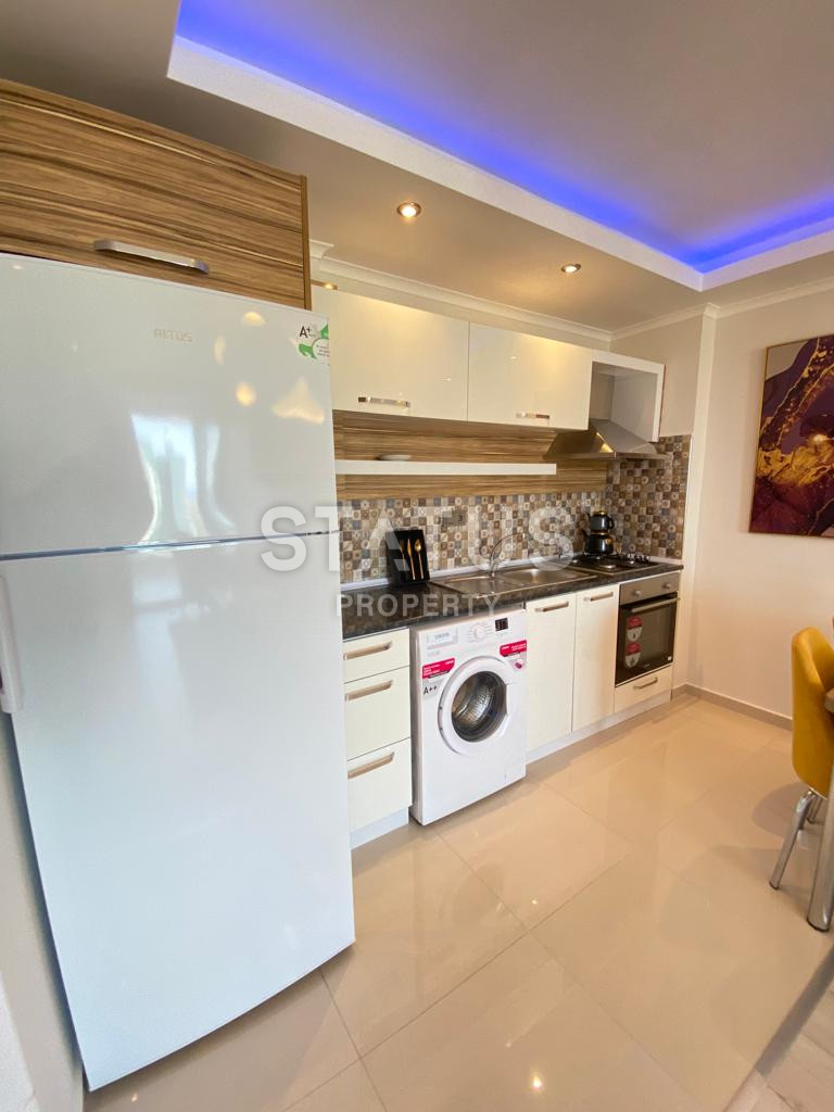 One bedroom furnished apartment with sea view in Mahmutlar. 65m2 фото 7