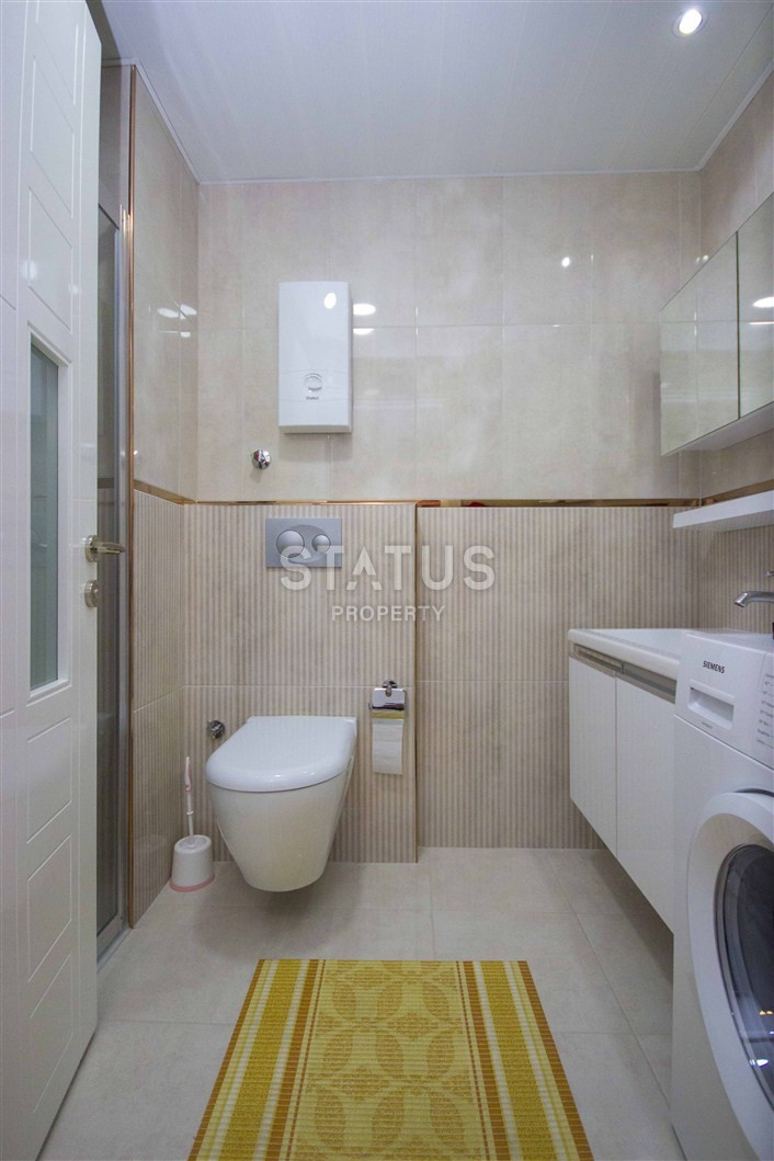 Меблированные двухкомнатные апартаменты в Джикджилли, 65 м2. фото 12