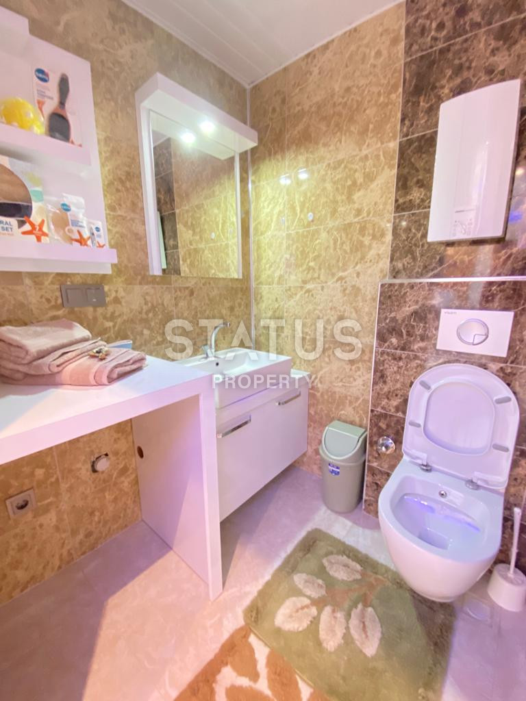 One bedroom furnished apartment with sea view in Mahmutlar. 65m2 фото 14