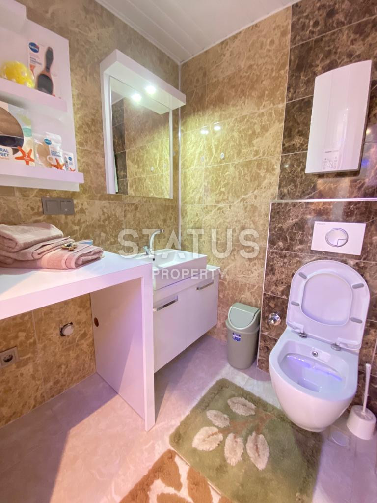 One bedroom furnished apartment with sea view in Mahmutlar. 65m2 фото 15