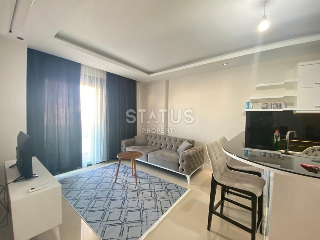 Two-room furnished apartment with a good location in the lower OBE. 55m2 фото 3