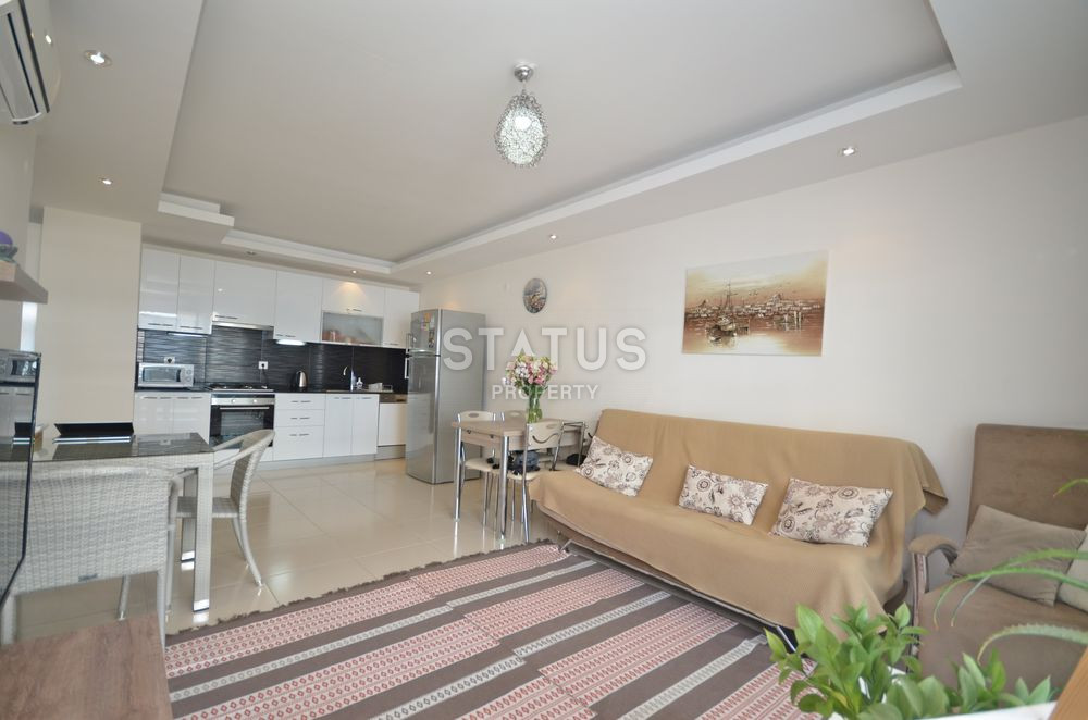 Просторная меблированная квартира 1+1 в Кестеле. 65м2 фото 4