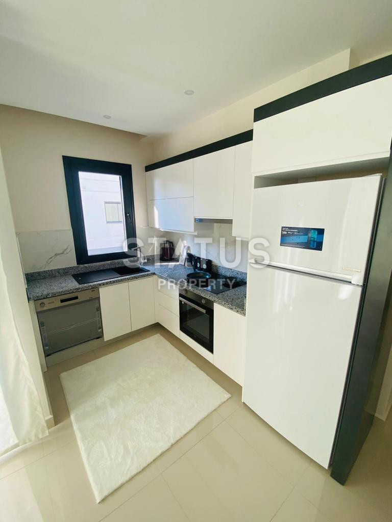 Furnished apartment in a luxury complex in Kargicak. фото 11